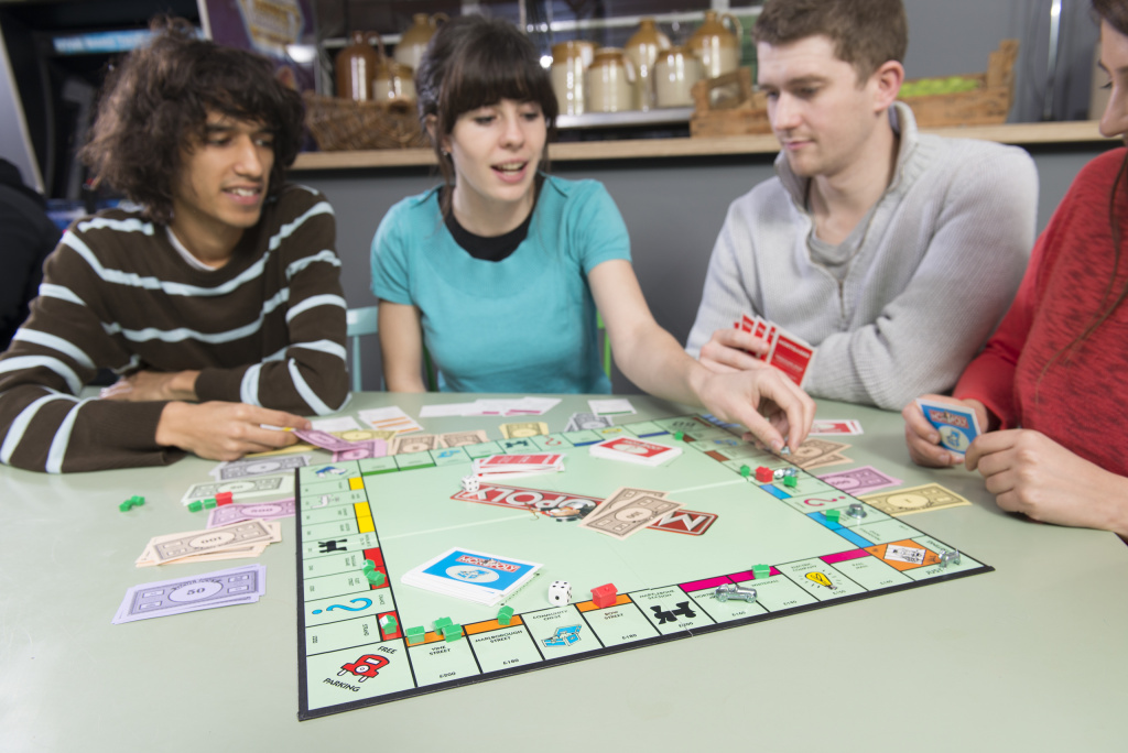 people-playing-monopoly-1429102983.jpeg